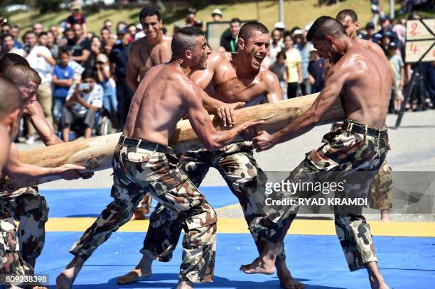Members of the Algerian Special Forces demonstrate their martial arts skills as they perform by the Army Museum at the Esplanade of Ryad el-Feth on...