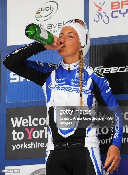 France's Pauline Ferrand Prevot celebrates winning the Women's Under 23 Elite Cross Country Olympic 2 Mountain Bike World Cup event at Dalby Forest,...