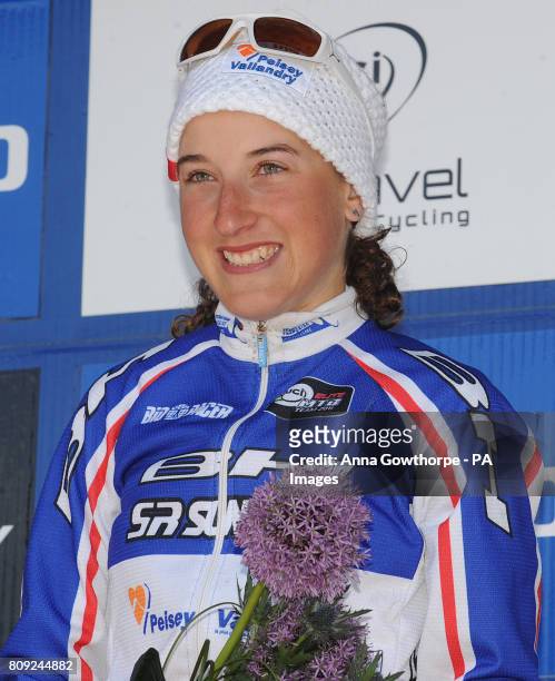 France's Julie Bresset celebrates winning the Women's Elite Cross Country Olympic 2 Mountain Bike World Cup event at Dalby Forest, North Yorkshire....