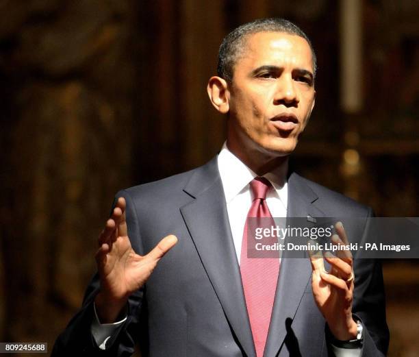 President Barack Obama, gestures during a tour of Westminster Abbey, in central London, as part of his three-day state visit to the UK.