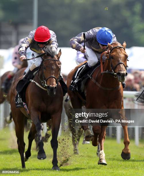 Kyllachy Star ridden by Paul Hanagan beats Pintura ridden by Jamie Spencer in the Layla Hotel Earl Grosvenor Handicap during the Boodles City Day at...