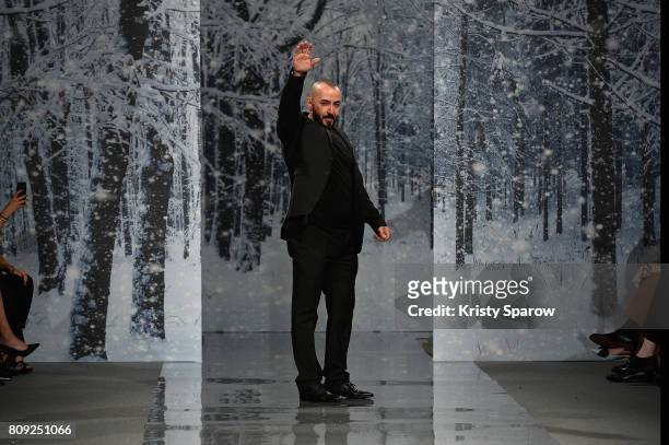 The designer Ziad Nakad greets the public at the end of the the Maison Ziad Nakad Haute Couture Fall/Winter 2017-2018 show as part of Haute Couture...