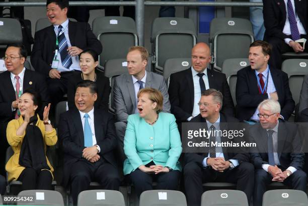 Peng Liyuan, Chinese President Xi Jinping, German Chancellor Angela Merkel , President of the German Football Association Reinhard Grindel and...