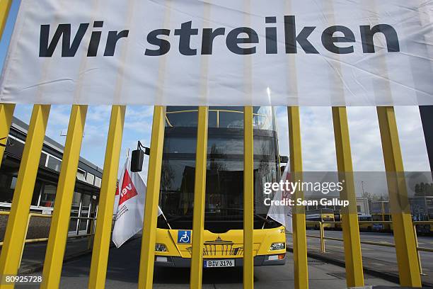 Sign announces a strike by bus driver of the Berlin city transit authority at a BVG bus depot on the first day of the resumption of their off and on...