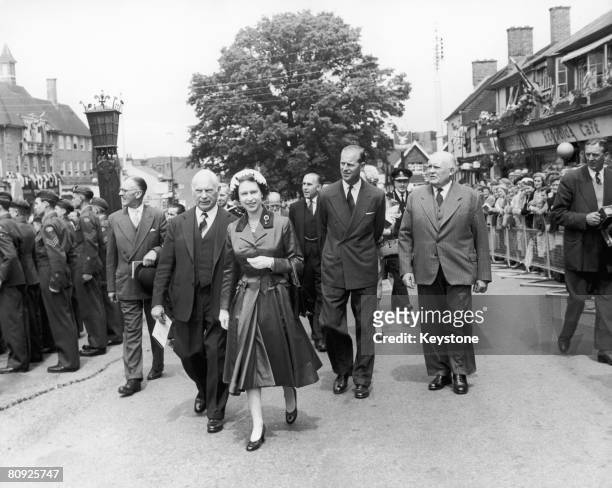 Queen Elizabeth II and Prince Philip, Duke of Edinburgh visiting the Sussex town of Crawley after opening the new Gatwick Airport, 9th June 1958....