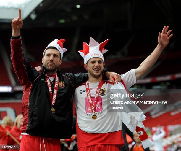 Stevenage goalscorer John Mousinho celebrates with team mate Jon Ashton after their side win during the npower League Two Play-Off Final at Old...