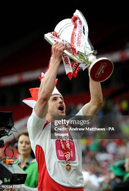 Stevenage goalscorer John Mousinho celebrates with the trophy after they won during the npower League Two Play-Off Final at Old Trafford, Manchester.