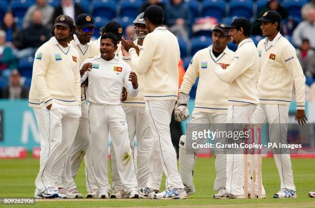 Sri Lanka's Rangana Herath celebrates as England's Kevin Pietersen is given out by the 3rd umpire during day four of the npower First Test at the...