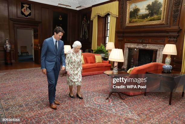 Queen Elizabeth II greets Canadian Prime Minister Justin Trudeau during an audience at the Palace of Holyroodhouse in Edinburgh, Scotland.