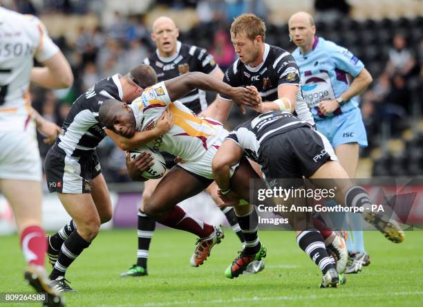 Huddersfield Giants' Jermaine McGillvary is tackled by Hull FC's Danny Houghton Joe Westerman and Sam Moa during the engage Super League match at the...