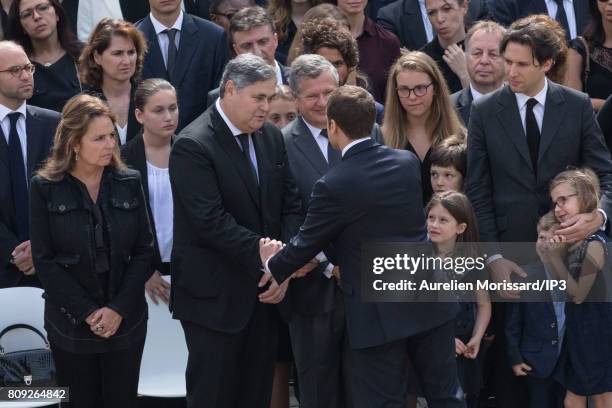 French President Emmanuel Macron greets Pierre Francois Veil and Jean Veil during the Funeral and national tribute to their mother Simone Veil at...