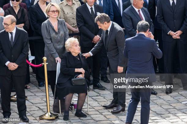 Former French President Nicolas Sarkozy greets Bernadette Chirac during the Simone Veil Funeral and national tribute at Hotel des Invalides on July...