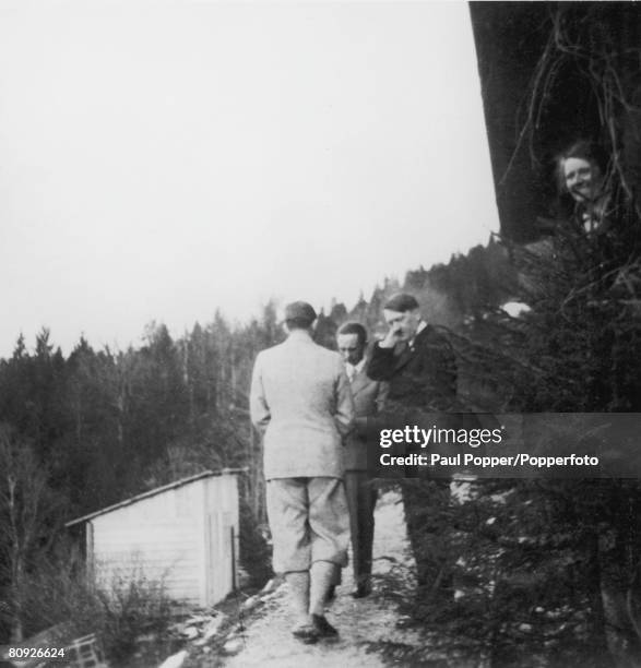 Nazi leader Adolf Hitler with Martin Bormann and Hermann Esser in the Berchtesgaden area, circa 1935.