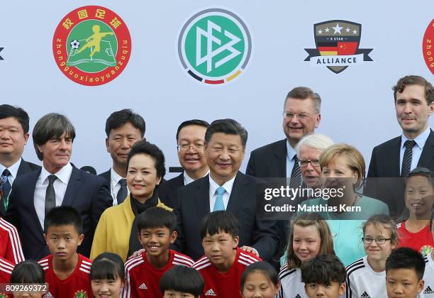 Peng Liyuan, Chinese President Xi Jinping, President of the German Football Association Reinhard Grindel, President of the German Football League...