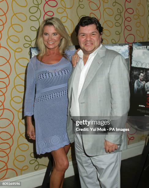 Jamie Foreman and his wife Julie Dennis arriving for the premiere of Screwed, at The Soho Hotel in central London.