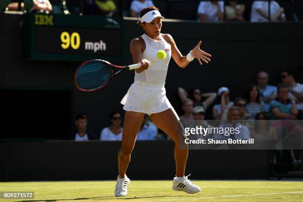 Qiang Wang of China plays a forehand during the Ladies Singles second round match against Venus Williams of The United States on day three of the...