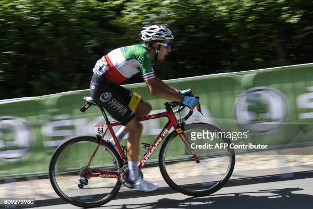 Italy's Fabio Aru climbs the last hill during the 160,5 km fifth stage of the 104th edition of the Tour de France cycling race on July 5, 2017...