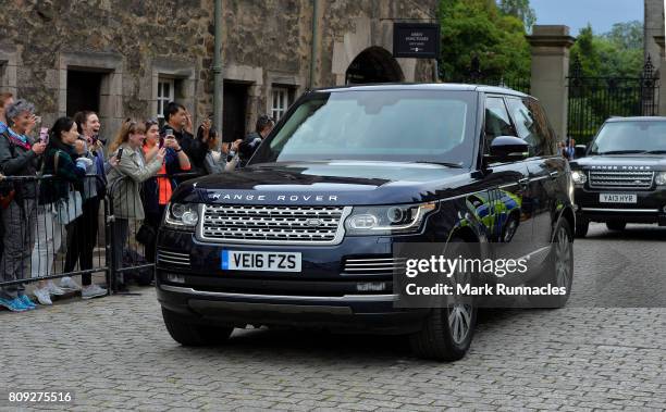 Canadian Prime Minister Justin Trudeau leaves Holyroodhouse in his Range Rover after an audience with The Queen at Holyroodhouse on July 5, 2017 in...