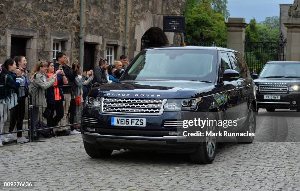Canadian Prime Minister Justin Trudeau leaves Holyroodhouse in his Range Rover after an audience with The Queen at Holyroodhouse on July 5, 2017 in...
