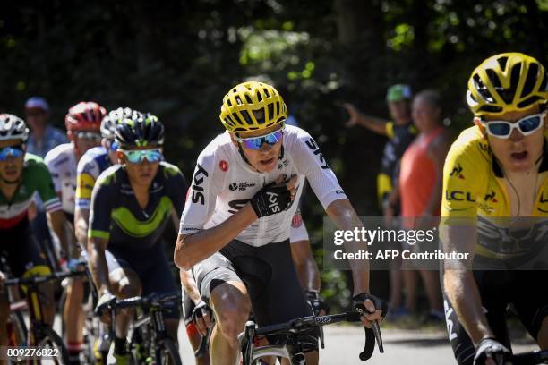 Great Britain's Geraint Thomas wearing the overall leader's yellow jersey, Great Britain's Christopher Froome, Colombia's Nairo Quintana and Italy's...