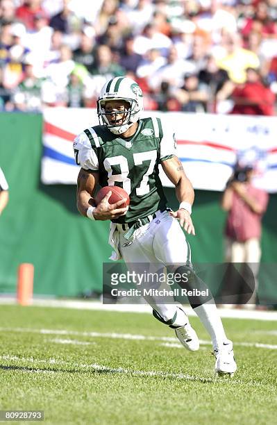 Punt Returner Laveranues Coles of the New York Jets in game action against the St. Louis Rams The St. Louis Rams went on to defeat the New York Jets...