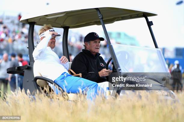 Soren Kjeldsen and Colm McLoughlin in a buggy during the Pro-Am of the Dubai Duty Free Irish Open at Portstewart Golf Club on July 5, 2017 in...