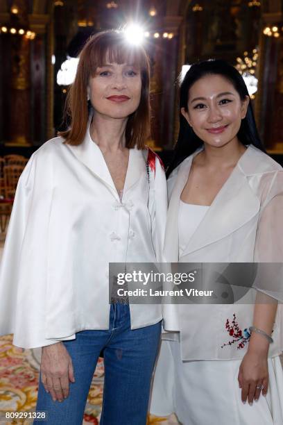 Actress Isabelle Huppert and Designer Lan Yu attend the Lan Yu Haute Couture Fall/Winter 2017-2018 show as part of Haute Couture Paris Fashion Week...