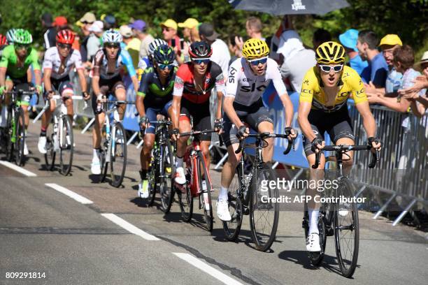 Great Britain's Geraint Thomas wearing the overall leader's yellow jersey, Great Britain's Christopher Froome, Australia's Richie Porte, Colombia's...