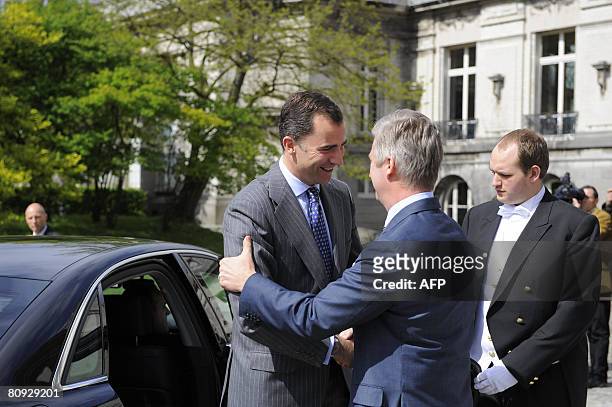 Spain's Prince of Asturias Felipe de Borbon is welcomed by Belgian Prince Philippe as he arrives at the Royals Palace in Brussels, on April 30 2008...
