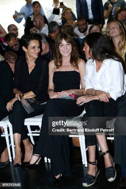 Farida Khelfa Seydoux, Carla Bruni-Sarkozy and Emmanuelle Alt attend the Jean Paul Gaultier Haute Couture Fall/Winter 2017-2018 show as part of Haute...