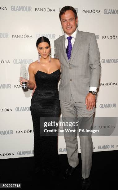 Peter Jones with winner of the Entrepreneur of the Year award Kim Kardashian, at the 2011 Glamour Women of the Year Awards in Berkeley Square, London.