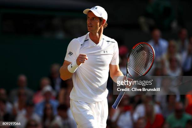 Andy Murray of Great celebrates victory after his Gentlemen's Singles second round match against Dustin Brown of Germany on day three of the...