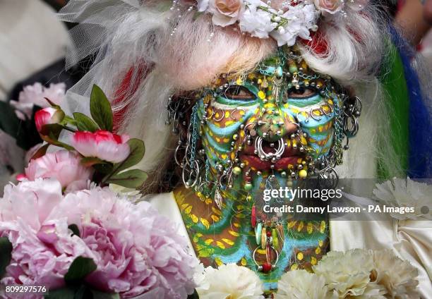 Elaine Davidson, who holds the record for World's Most Pierced Woman with 6,925 piercings, outside Edinburgh Registry Office following her wedding to...