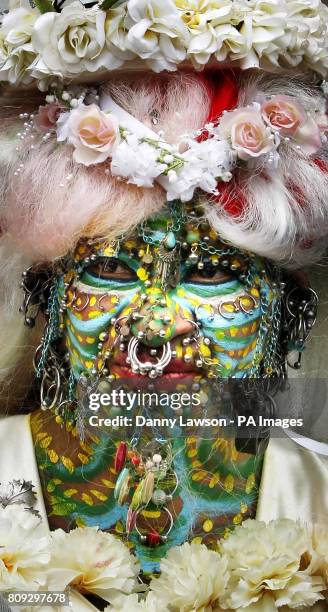 Elaine Davidson, who holds the record for World's Most Pierced Woman with 6,925 piercings, outside Edinburgh Registry Office following her wedding to...