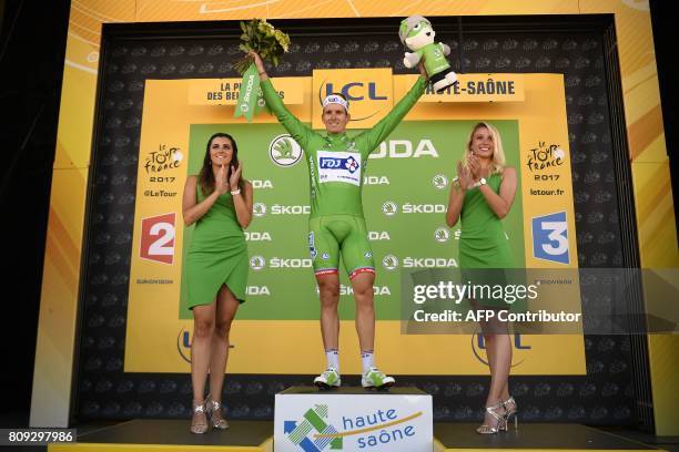 France's Arnaud Demare celebrates his green jersey of best sprinter on the podium at the end of the 160,5 km fifth stage of the 104th edition of the...