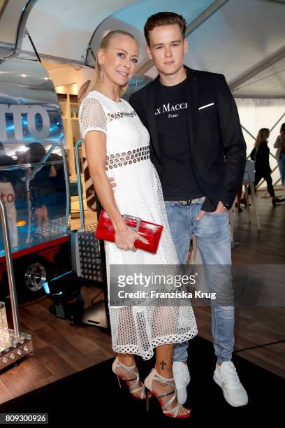Jenny Elvers and her son Paul Jolig attend the Guido Maria Kretschmer Fashion Show Autumn/Winter 2017 presented by OTTO at Tempodrom on July 5, 2017...
