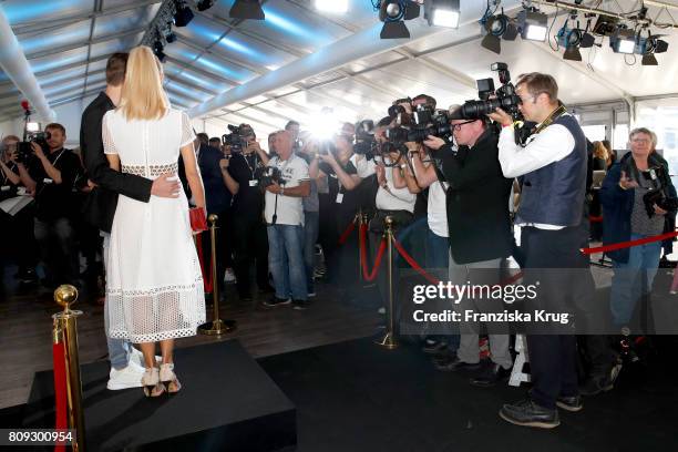 Jenny Elvers and her son Paul Jolig attend the Guido Maria Kretschmer Fashion Show Autumn/Winter 2017 presented by OTTO at Tempodrom on July 5, 2017...