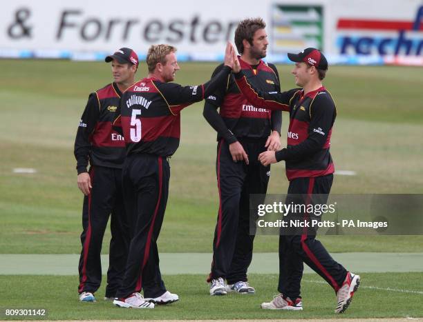 Durham's Paul Collingwood celebrates trapping Northamptonshire's Rob White LBW during the Friends Life T20 North Group match at the County Ground,...