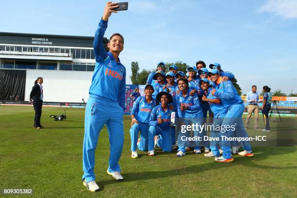 Sushma Verma of India takes a selfie with team mates following the ICC Women's World Cup match between Sri Lanka and India at The 3aaa County Ground...