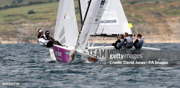 S match racing crew of Sally Berkow, Elizabeth Kratizig-Burnham and Alana O'Reilly lead Great Britain's Lucy and Kate Macgregor with Annie Lush...