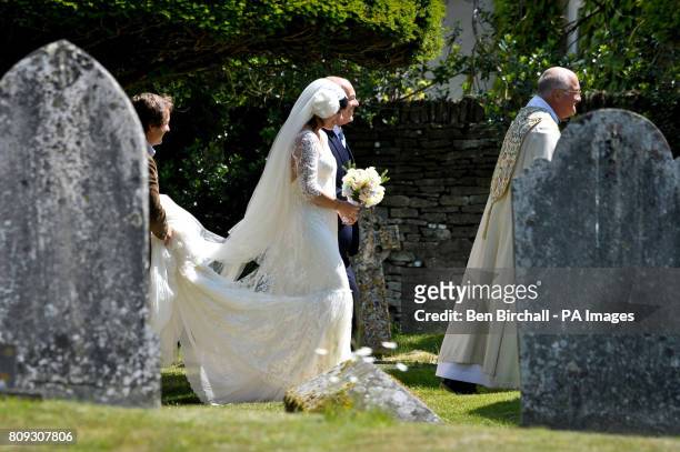 Lily Allen arrives at St James The Great Church in Cranham with her father Keith Allen for her wedding to Sam Cooper.