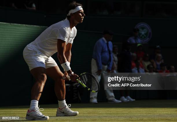 Spain's Rafael Nadal waits to receive a serve from US player Donald Young during their men's singles second round match on the third day of the 2017...