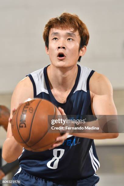 Ding Yanyuhang of the Dallas Mavericks shoots a foul shot against the Oklahoma City Thunder during the Mountain Dew Orlando Pro Summer League on July...