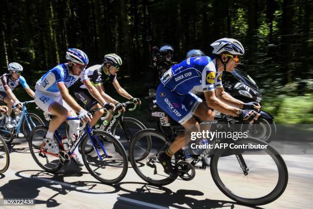 Belgium's Philippe Gilbert, Norway's Edvald Boasson Hagen, France's Mickael Delage and Belgium's Jan Bakelants ride in a breakaway during the 160,5...