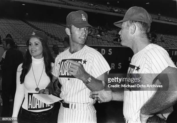 Martin Milner and Kent McCord co-stars of the hit 1970's TV show Adam 12 discuss tactics before a charity baseball game against real cops on...