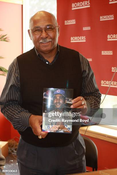 Former Chicago Cubs Hall of Fame baseball player, Billy Williams and co-author Fred Mitchell sign copies of their book "Billy Williams: My...