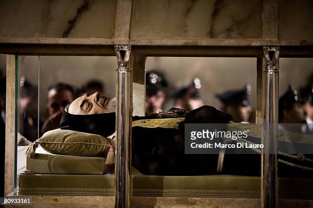 The body of Padre Pio is seen on display to the faithful in the church of Santa Maria delle Grazie on April 24, 2008 in San Giovanni Rotondo, about...