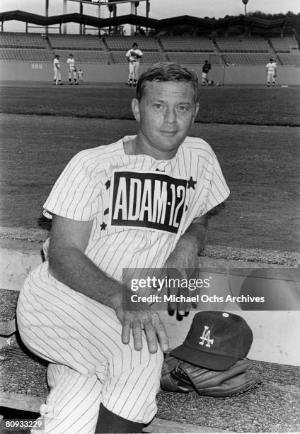 Martin Milner co-star of the hit 1970's TV show Adam 12 poses for a photo before a charity baseball game against real cops on September 5 1972 at...