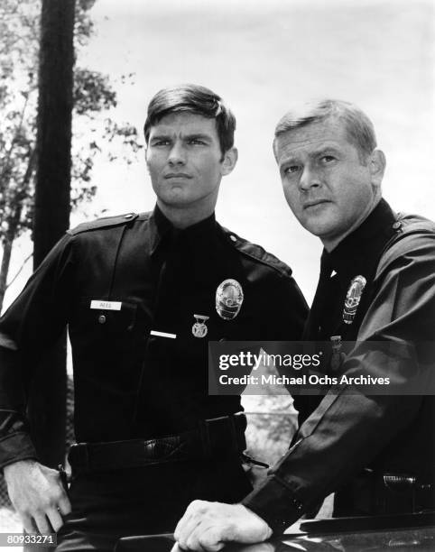 Martin Milner and Kent McCord co-stars of the hit 1970's TV show Adam 12 in a scene from the third season opener in 1970 in Los Angeles, California.