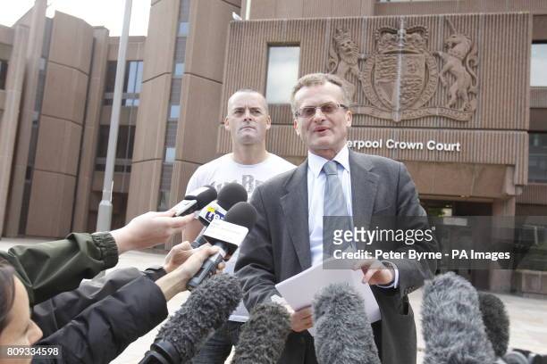 Solicitor Robin Makin read a statement to the media as Ralph Bulger, the father of James Bulger, looks on outside Liverpool Crown Court as they made...